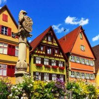 View of Ledermarkt square with its famous fountain Lowenbrunnen - Dinkelsbuhl, Germany