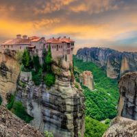 Religious Greek monastery inside the site of Meteora village at dusk