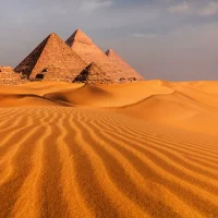 sunset-view-of-pyramid-complex-of-giza-in-cairo-2025-01-09-17-54-04-utc2.webp